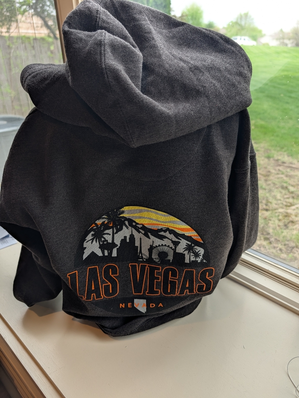 Las Vegas Graphic Hoodie - Black with Orange and Yellow Print